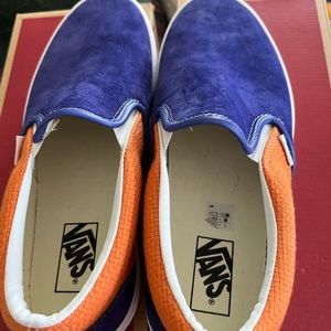 Vans classic slip on size 10.5 men 12.0 woman.  Worn a few times but too big